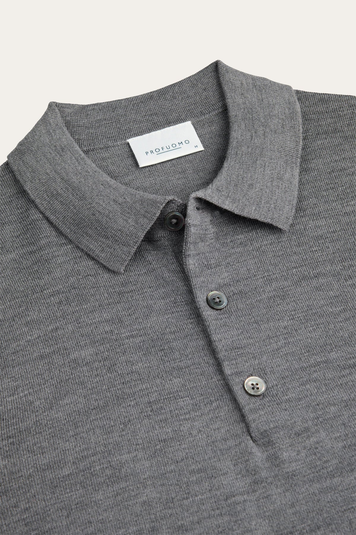 Donkergrijze merino polo