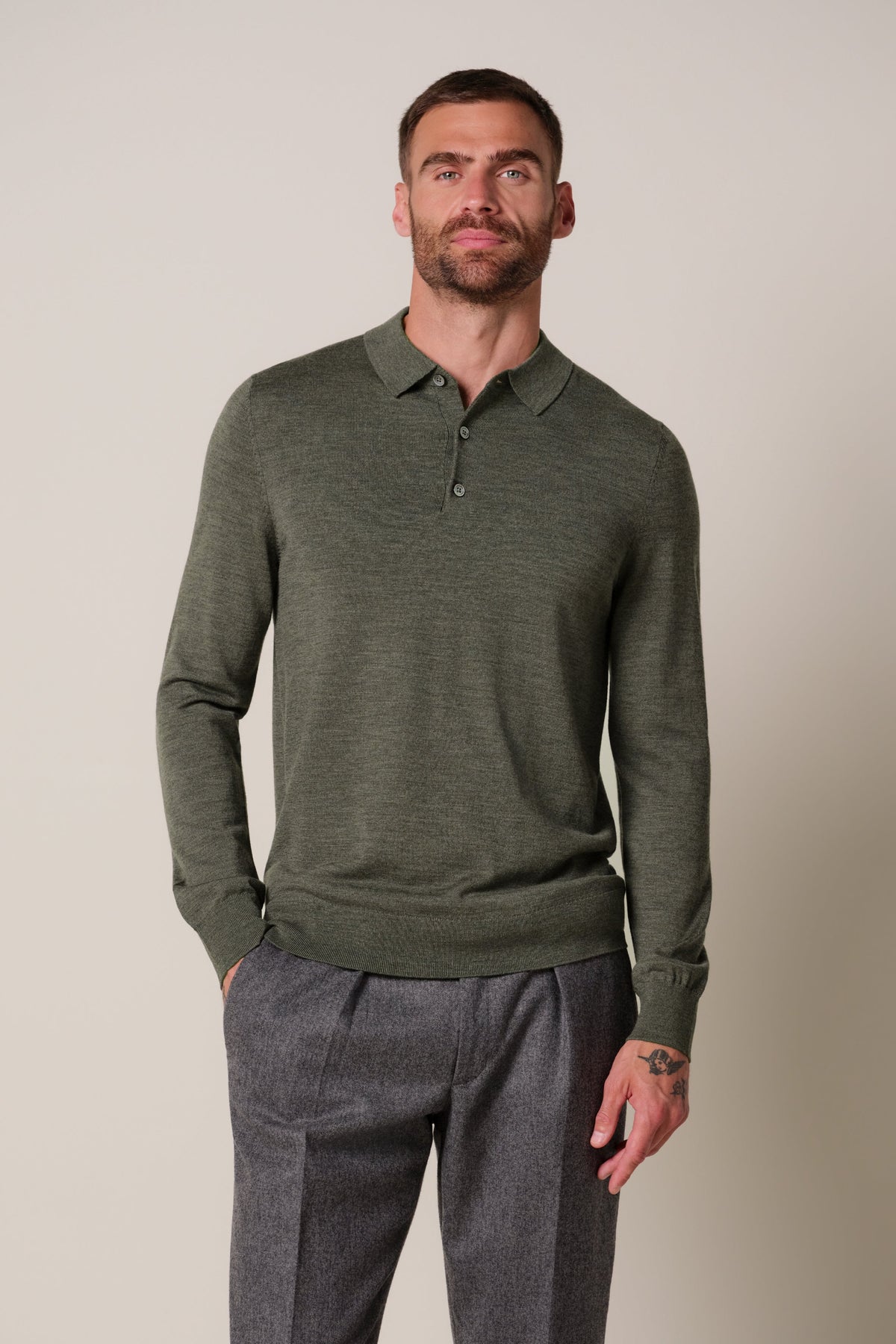 Donkergroene merino polo