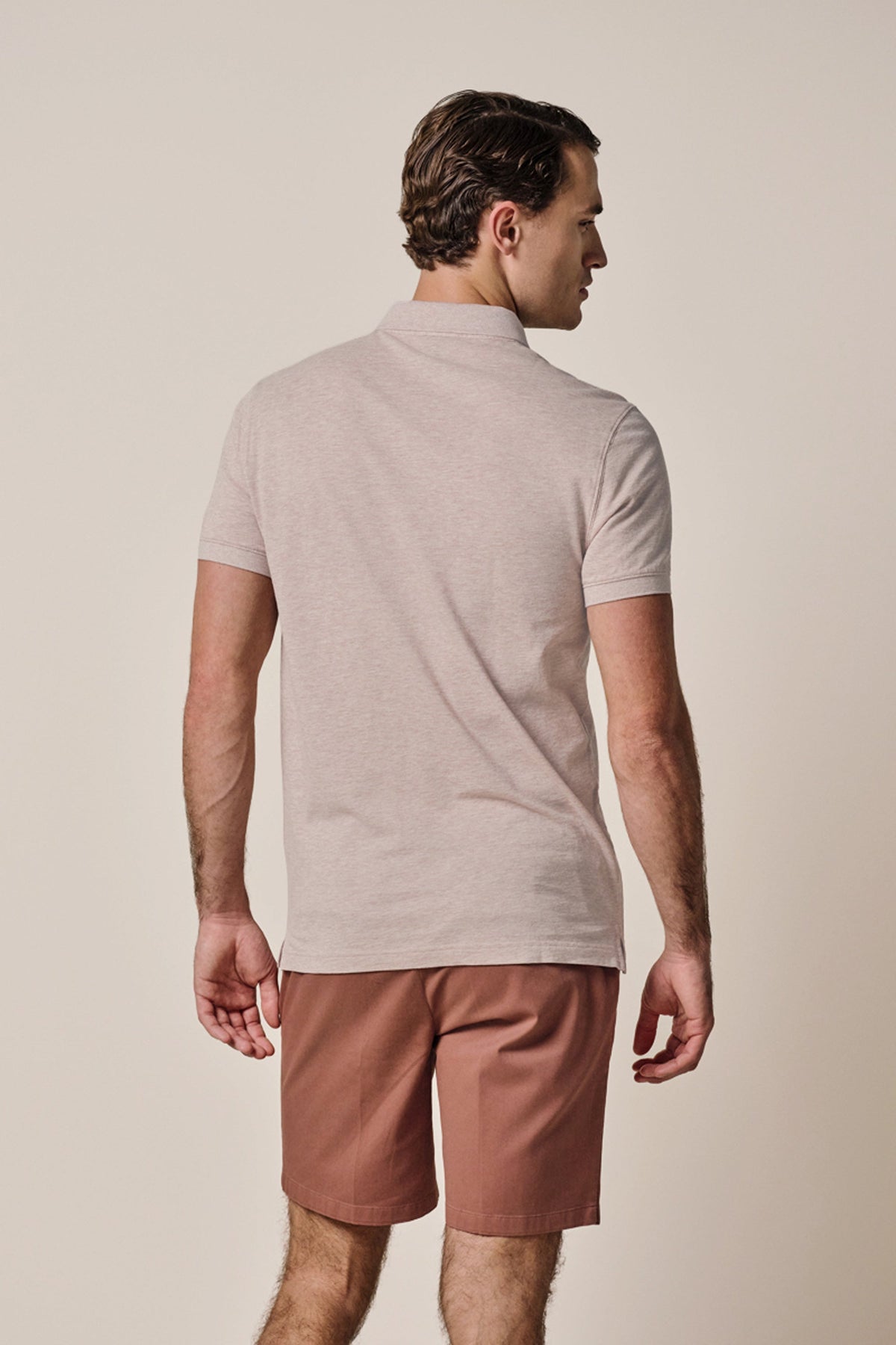 Donkerroze stretch piqué polo