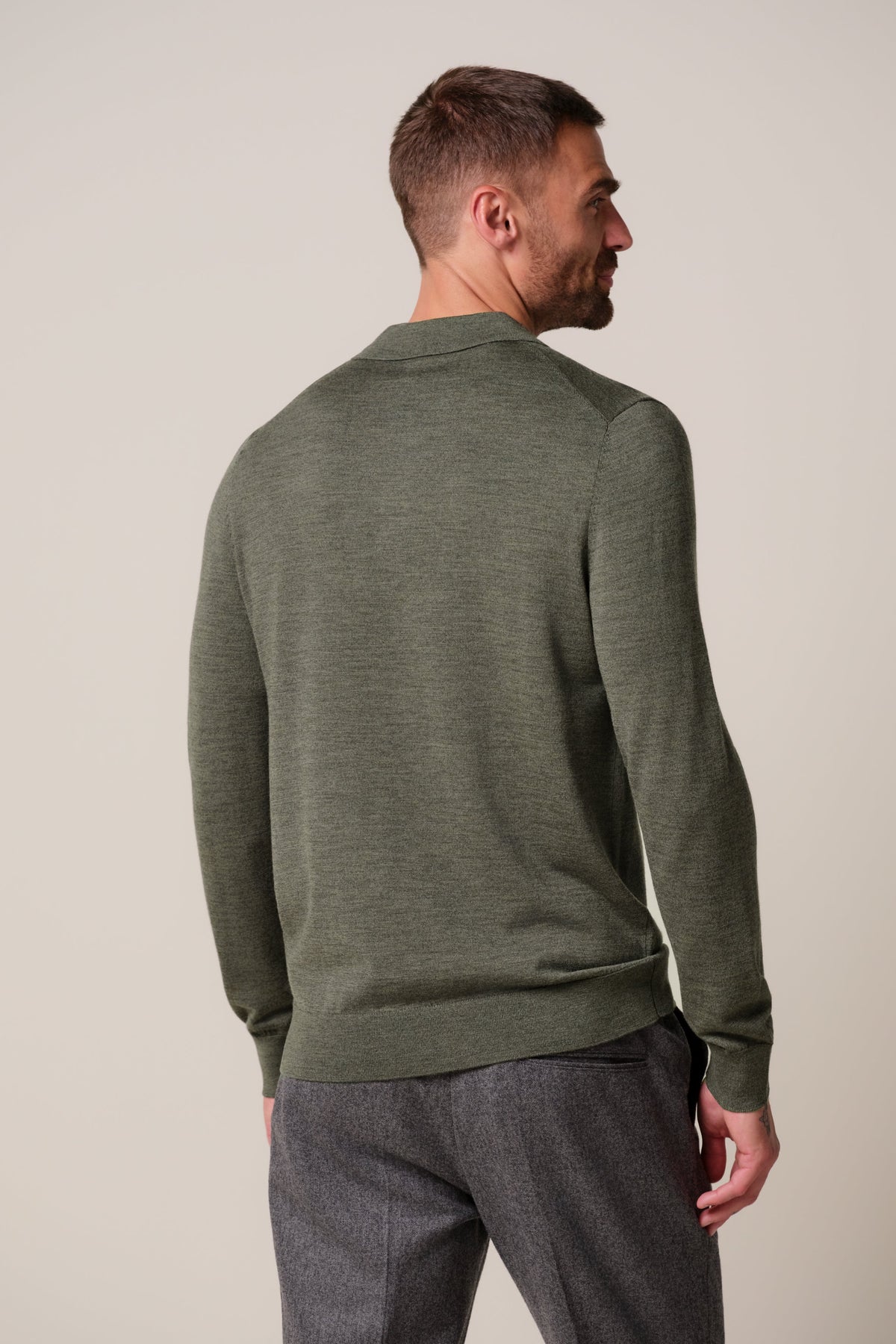 Donkergroene merino polo