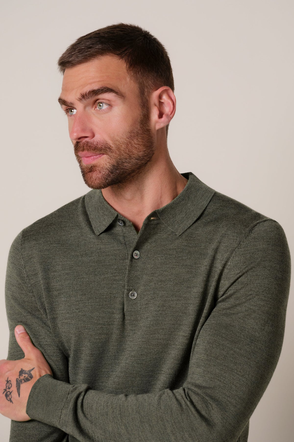 Donkergroene merino polo