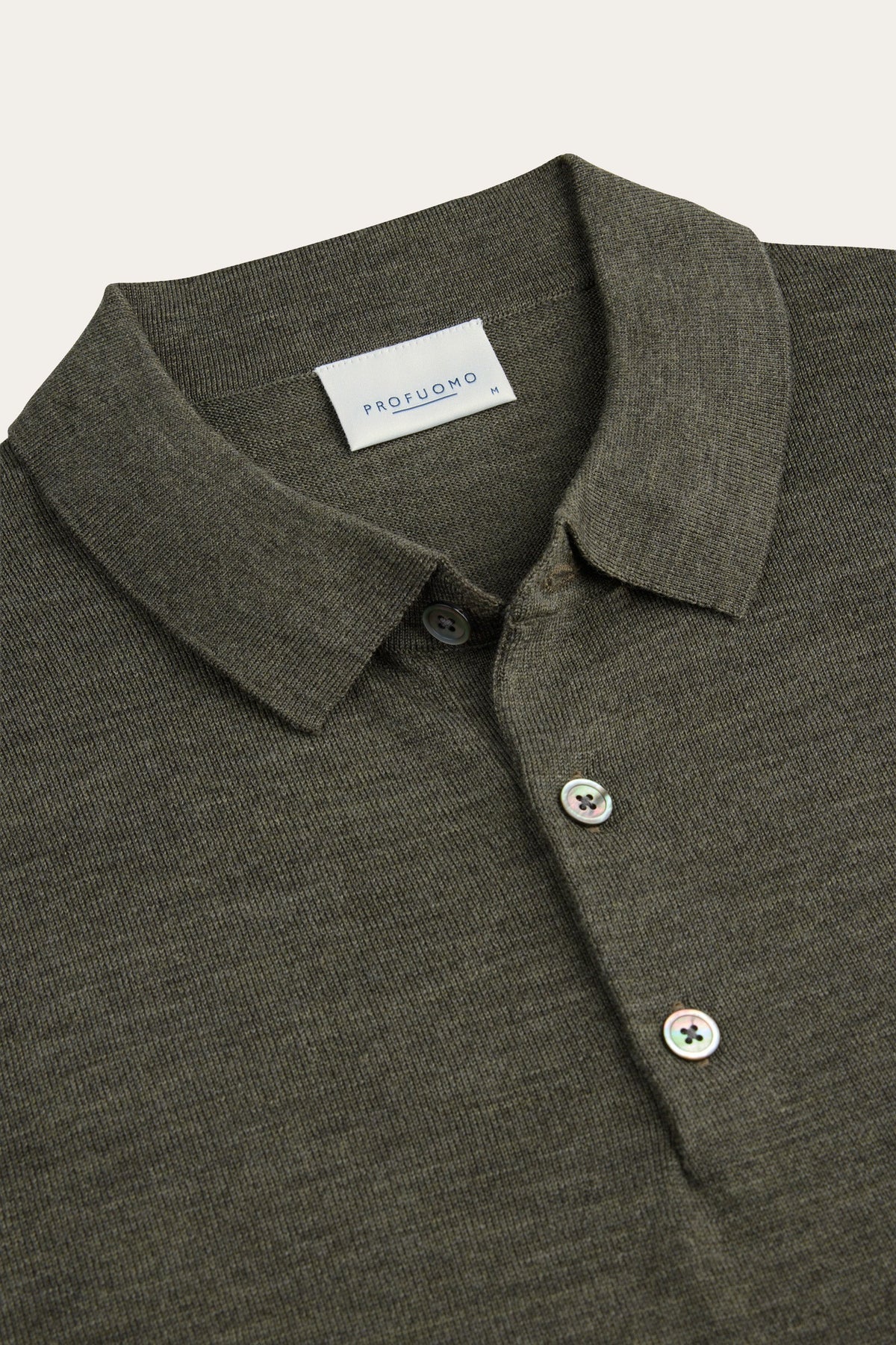 Donkergroene merino polo