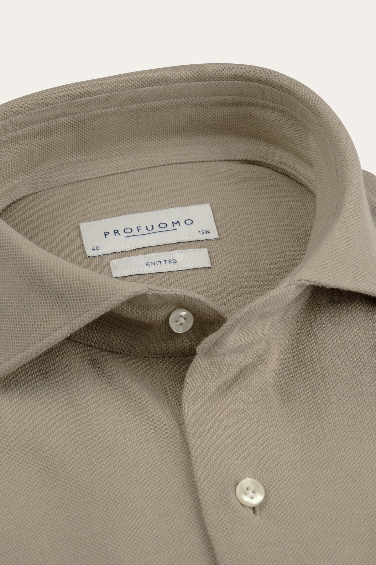 Beige knitted overhemd