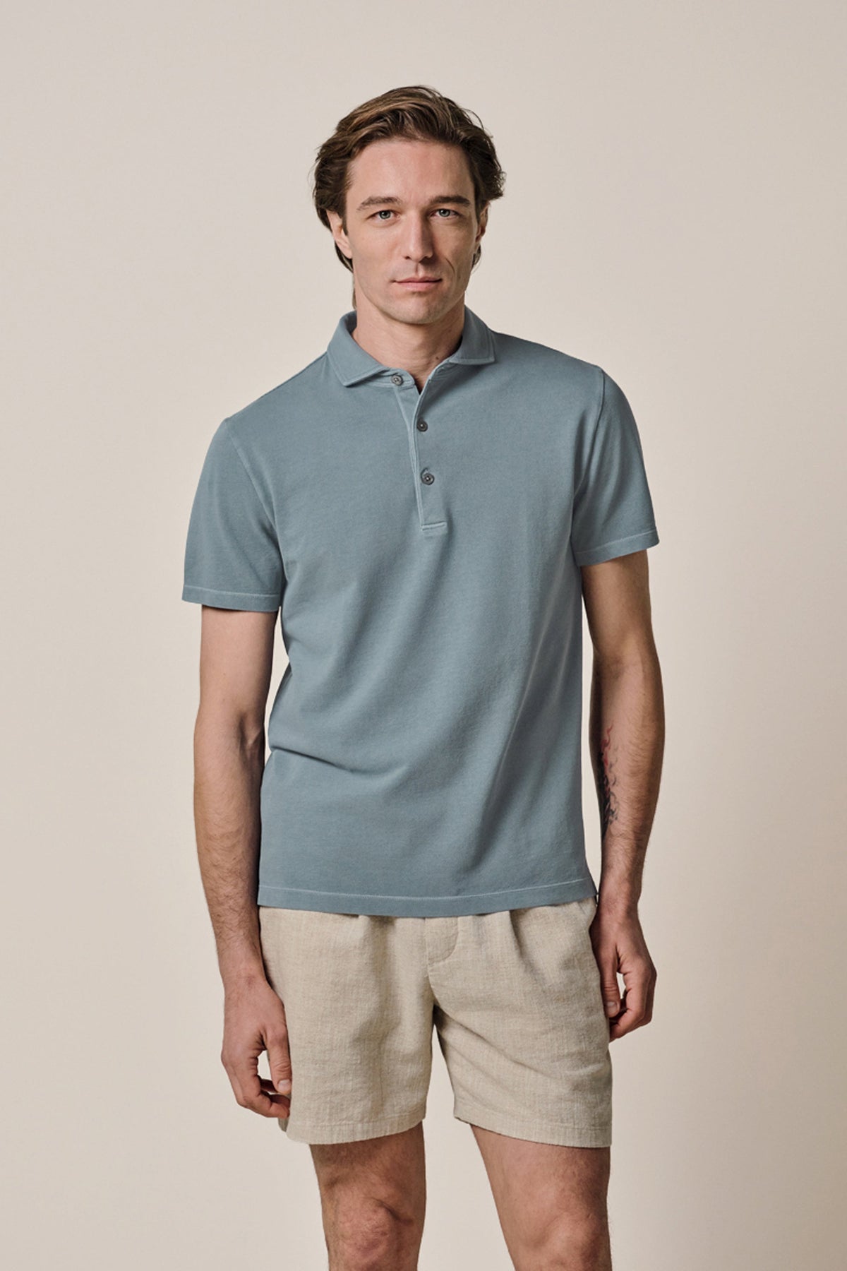 Grijsblauwe Garment dye polo