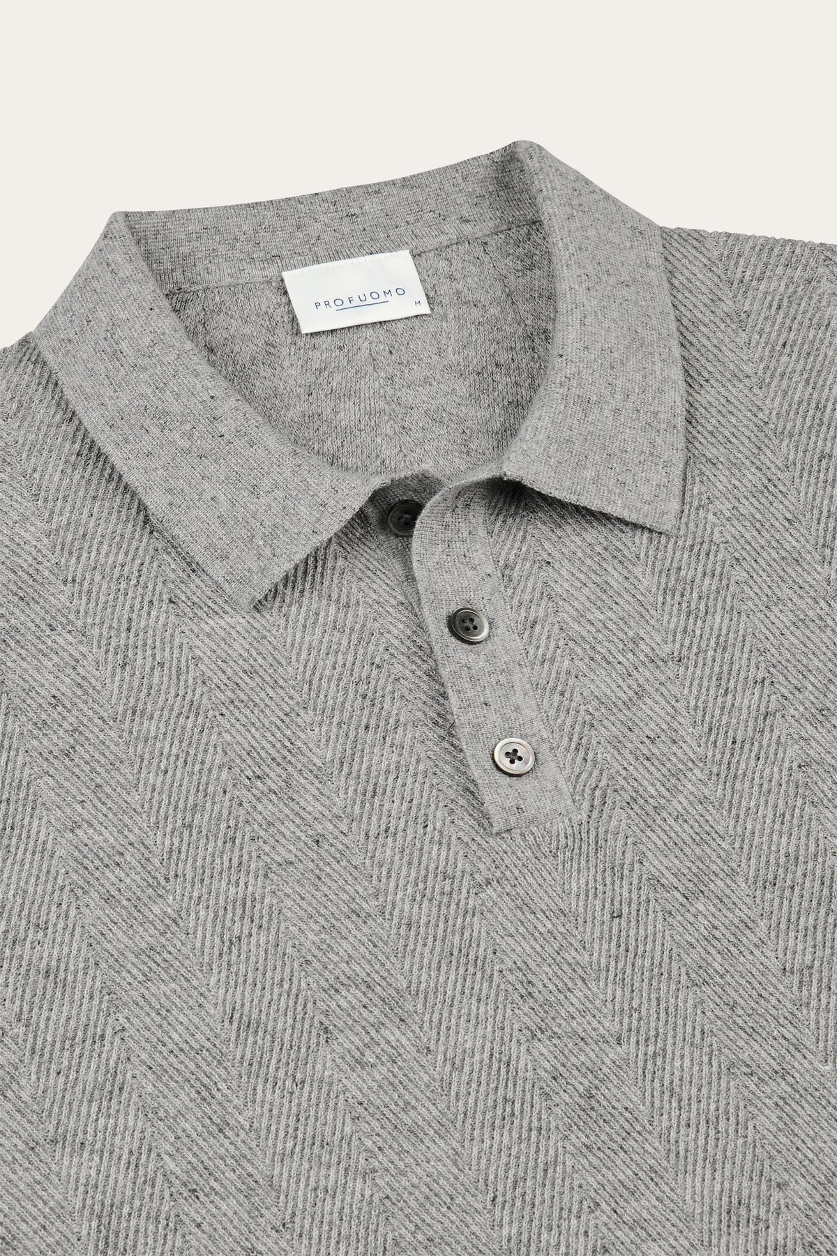 Grijze visgraat polo